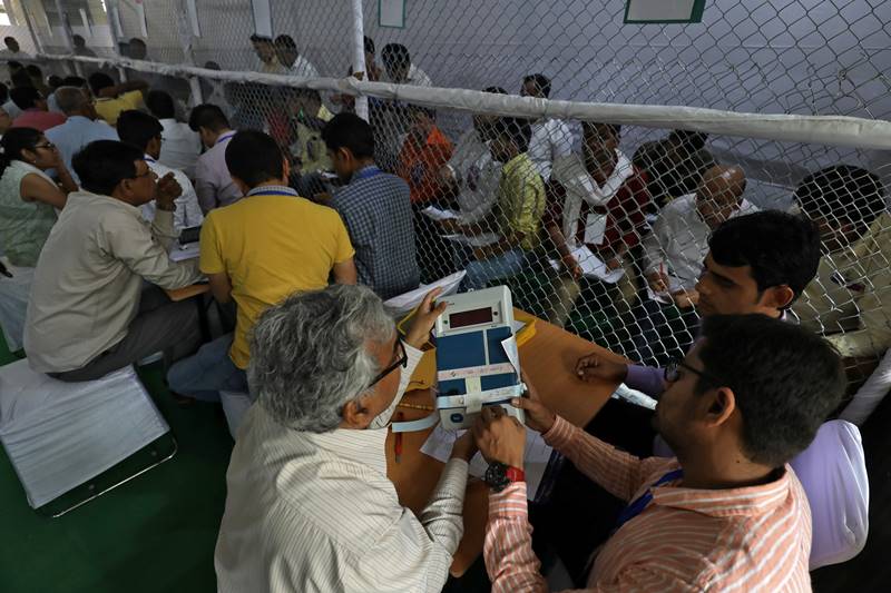 Election staff prepare to count votes inside a vote counting centre in the national capital. (Reuters)