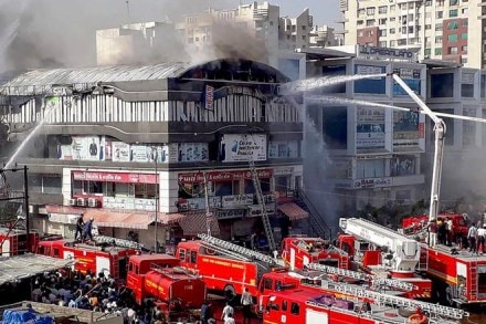 The inquiry revealed that fire on the fourth floor of Takshashila Arcade in Sarthana area of Surat was triggered by a spark in an outer unit of an air conditioner. The inquiry revealed that fire on the fourth floor of Takshashila Arcade in Sarthana area of Surat was triggered by a spark in an outer unit of an air conditioner.
