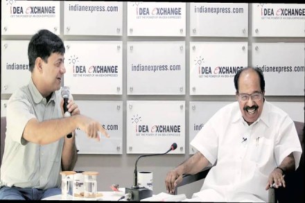 Congress leader Veerappa Moily with Chief of National Bureau Ravish Tiwari at The Indian Express newsroom in Delhi. (Express Photo by Praveen Khanna)
