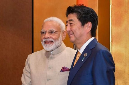 Prime Minister Narendra Modi shakes hands with his Japanese counterpart Shinzo Abe prior to their meeting in Osaka (PTI Photo)