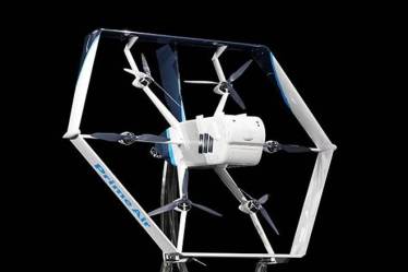 The new device takes off vertically, then tilts to fly horizontally like a plane. (AP Photo)