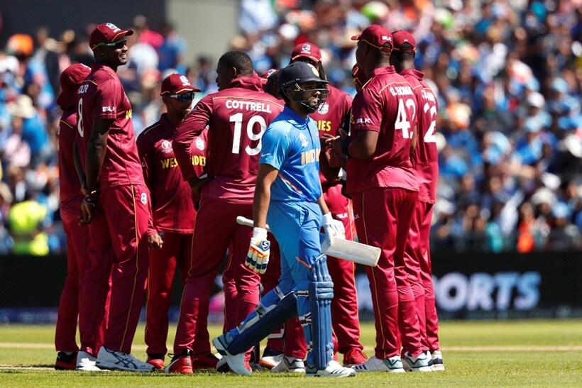 David Warner shakes hands with the Afghanistan's Najibullah Zadran at the end of the match. (Action Images via Reuters)