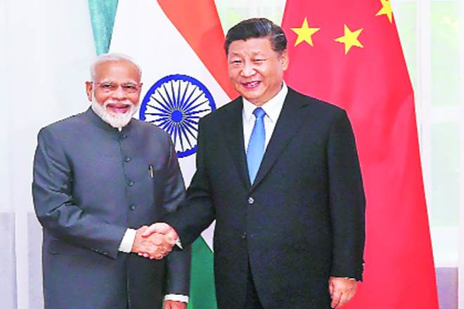 Prime Minister Narendra Modi with Chinese President Xi Jinping ahead of the SCO summit, in Bishkek on Thursday