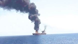 In this photo released by IRIB News Agency, an oil tanker is seen on fire in the Sea of Oman on Thursday. Two tankers near the strategic Strait of Hormuz were reportedly attacked. The US Navy rushed to assist amid heightened tensions between Washington and Tehran