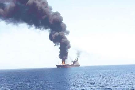 In this photo released by IRIB News Agency, an oil tanker is seen on fire in the Sea of Oman on Thursday. Two tankers near the strategic Strait of Hormuz were reportedly attacked. The US Navy rushed to assist amid heightened tensions between Washington and Tehran In this photo released by IRIB News Agency, an oil tanker is seen on fire in the Sea of Oman on Thursday. Two tankers near the strategic Strait of Hormuz were reportedly attacked. The US Navy rushed to assist amid heightened tensions between Washington and Tehran