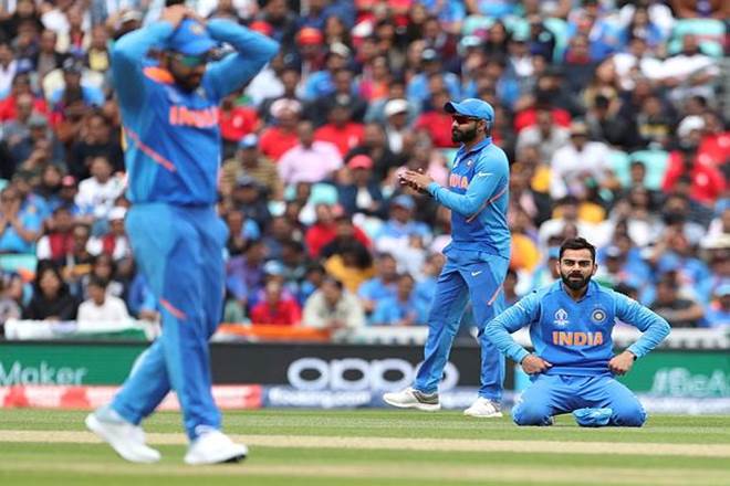 Virat Kohli reacts after missing a chance to run-out Australia's captain Aaron Finch during the Cricket World Cup match between Australia and India at The Oval in London. (AP Photo)