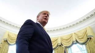 US President Donald Trump walks in the Oval Office of the White House (Reuters photo)