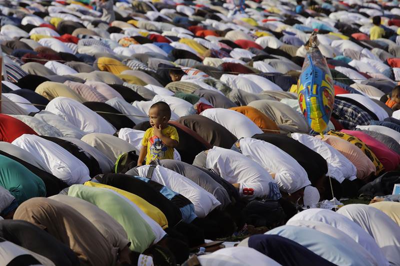 During the holy month of Ramadan, the Muslims refrained from eating, drinking, smoking or any such activity from dawn to dusk. The holiday lasts one to three days. (AP Photo)