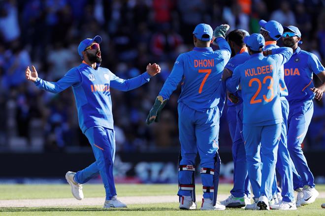 Cricket - ICC Cricket World Cup - India v Afghanistan - The Ageas Bowl, Southampton, Britain - June 22, 2019 India's Virat Kohli celebrates the wicket of Afghanistan's Mujeeb Ur Rahman, the final wicket to win the match Action Images via Reuters/Paul Childs