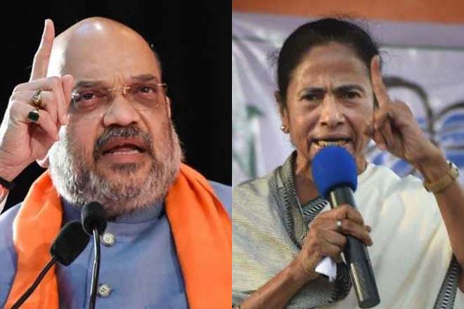 File pic of Amit Shah and Mamata Banerjee, Both the BJP and TMC are at the loggerheads ever since the results of the Lok Sabha elections were announced. File pic of Amit Shah and Mamata Banerjee, Both the BJP and TMC are at the loggerheads ever since the results of the Lok Sabha elections were announced.