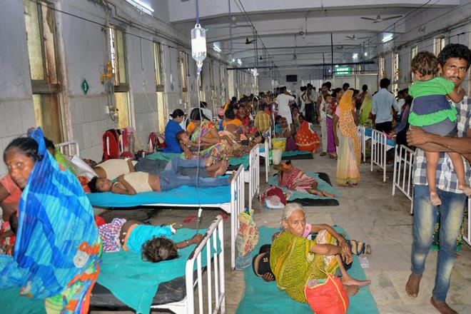 Children showing symptoms of Acute Encephalitis Syndrome (AES) being treated at a hospital, in Muzaffarpur. (PTI Photo)