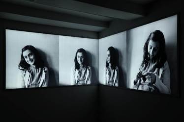 Photos of Anne Frank are seen at Anne Frank House museum in Amsterdam, Netherlands. (Reuters)