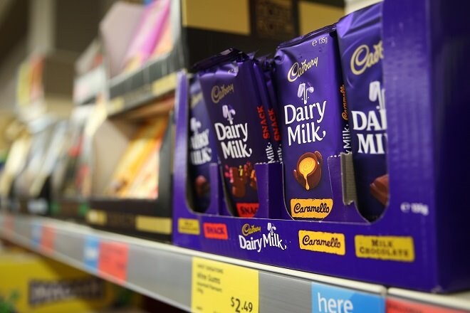 Bars of Cadbury Ltd. Dairy Milk chocolate sit for sale at an Aldi Stores Ltd. food store in Sydney, Australia, on Thursday, June 25, 2015. Australia's biggest supermarkets are losing favor with debt investors as a challenge from German discounter Aldi intensifies competition. Photographer: Brendon Thorne/Bloomberg