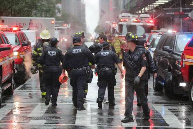 Rescue vehicles swarmed to the scene a few blocks from Rockefeller Center.