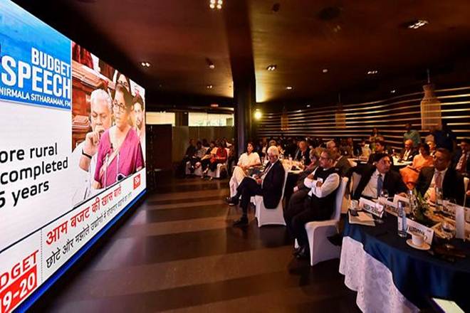 Industrialist Rakesh Bharti Mittal, Naresh Trehan and others watch the live telecast of Finance Minister Nirmala Sitharaman tabling the Union Budget 2019-20.