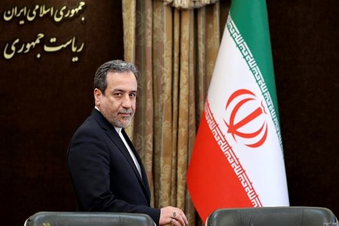 Iranian Deputy Foreign Minister Abbas Araghchi attends a press briefing in Tehran (AP Photo)