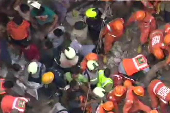 A team of Mumbai police along with fire brigade, civic officials rushed to the site to carry on the rescue and relief operations. (ANI Image) A team of Mumbai police along with fire brigade, civic officials rushed to the site to carry on the rescue and relief operations. (ANI Image)