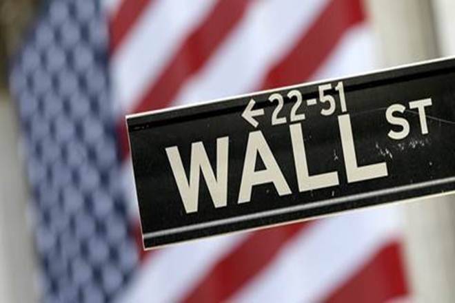 The benchmark S&P 500 erased earlier marginal gains after a Wall Street Journal report on the Fed's plans.