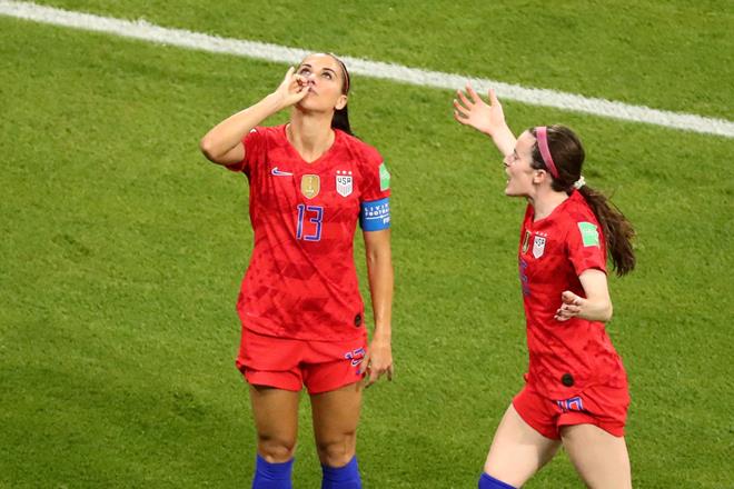 Alex Morgan of the US celebrates scoring their second goal against England with teammate Rose Lavelle. (Reuters) Alex Morgan of the US celebrates scoring their second goal against England with teammate Rose Lavelle. (Reuters)