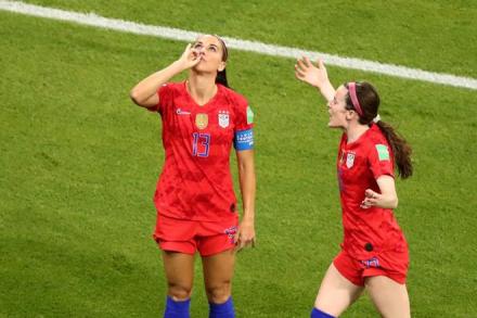 Alex Morgan of the US celebrates scoring their second goal against England with teammate Rose Lavelle. (Reuters)