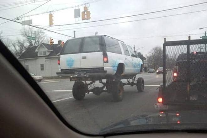 Imagine turning this car violently or it doesn't even have to be violent - just a gentle turn might tip it over. You don't need to raise your car like this - hydraulics or no. Just don't.