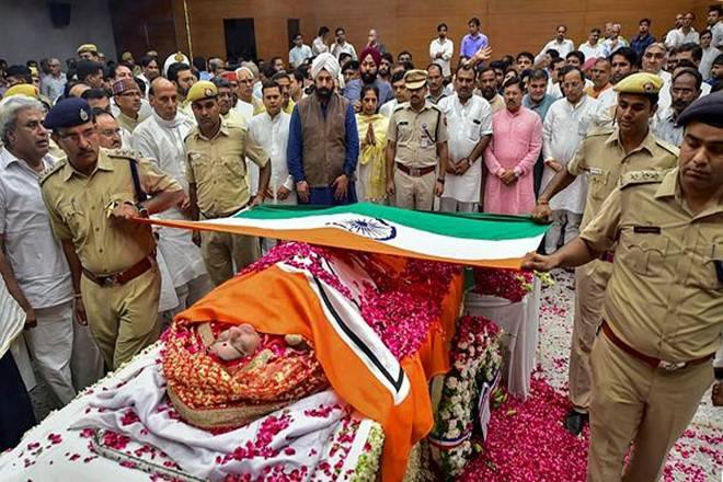 Former External Affairs Minister Sushma Swaraj wrapped in tricolour at BJP headquarters (PTI Photo)