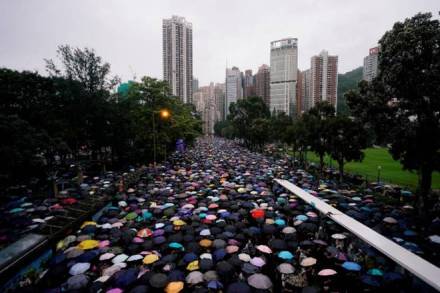 Anti-extradition bill protesters march to demand democracy and political reforms, in Hong Kong, China (Reuters/F)