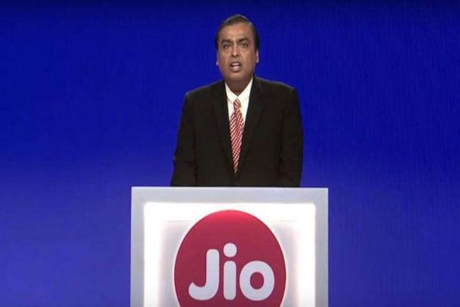 Mukesh Ambani, chairman, RIL, on Monday said at the company’s 42nd AGM that Jio Fibre’s premium customers will be able to watch new movies in their living rooms the same day these movies are released in theatres. (PTI Photo) Mukesh Ambani, chairman, RIL, on Monday said at the company’s 42nd AGM that Jio Fibre’s premium customers will be able to watch new movies in their living rooms the same day these movies are released in theatres. (PTI Photo)