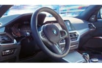  The cruise control on the higher models of the BMW 3 Series is fairly simple to operate and the start/stop function saves fuel when needed. 