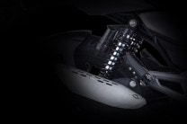 Gas charged twin shock absorbers at the rear