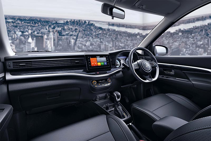 The cabin of the XL6 is exactly the same as that of the Ertiga. The only major difference is that the former comes with an all-black colour scheme. In addition to this, the faux wood insert on the dashboard is also of a darker colour and is highlighted by a silver accent.