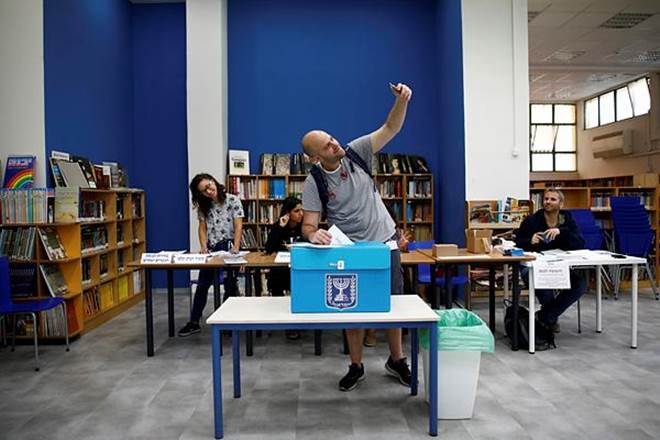 Some 6.4 million people are eligible to cast ballots (Reuters) Some 6.4 million people are eligible to cast ballots (Reuters)