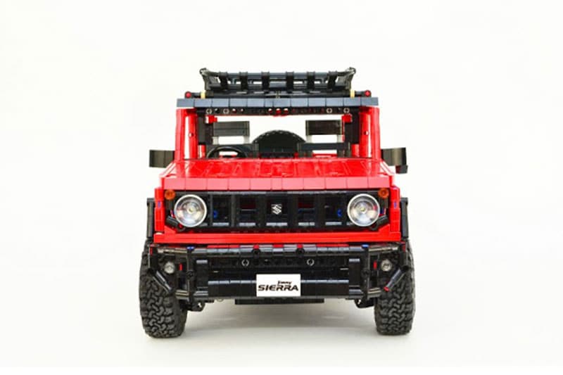 The 1:10 scale model of the Suzuki Jimny made with Lego bricks looks the part. It has the unmistakable silhouette of the compact 4x4, the high-rise bonnet, big wheels, the classic box design among others. It even gets a roof-mounted luggage carrier. It comes with a dual-tone colour scheme, with the body made of red Lego bricks, while black ones are used for making the roof.