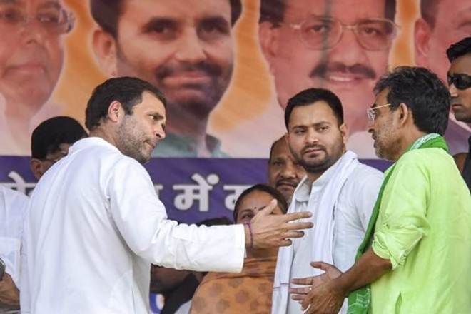 Congress president Rahul Gandhi with RJD leader Tejashwi Yadav and RLSP chief Upendar Kushwaha during an election rally. (File photo/PTI)