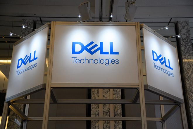 The Dell Technologies Inc. logo is displayed at the company's booth during the SoftBank World 2019 event in Tokyo, Japan, on Thursday, July 18, 2019. The founders of Southeast Asian ride-hailing giant Grab, indoor farming startup Plenty, Indian hotel chain OYO Rooms and payments service Paytm took the stage at an annual SoftBank conference to explain how artificial intelligence helps them stay on top in their respective fields. Photographer: Akio Kon/Bloomberg The Dell Technologies Inc. logo is displayed at the company's booth during the SoftBank World 2019 event in Tokyo, Japan, on Thursday, July 18, 2019. The founders of Southeast Asian ride-hailing giant Grab, indoor farming startup Plenty, Indian hotel chain OYO Rooms and payments service Paytm took the stage at an annual SoftBank conference to explain how artificial intelligence helps them stay on top in their respective fields. Photographer: Akio Kon/Bloomberg