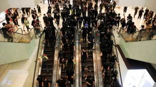 Multiple pro-democracy activists have been attacked by pro-Beijing supporters in recent months (Reuters image)