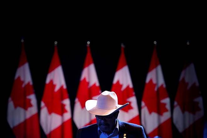 A supporter is seen at the Conservative leader Andrew Scheer's campaign headquarters during the federal election in Regina, Saskatchewan, Canada (Reuters) A supporter is seen at the Conservative leader Andrew Scheer's campaign headquarters during the federal election in Regina, Saskatchewan, Canada (Reuters)