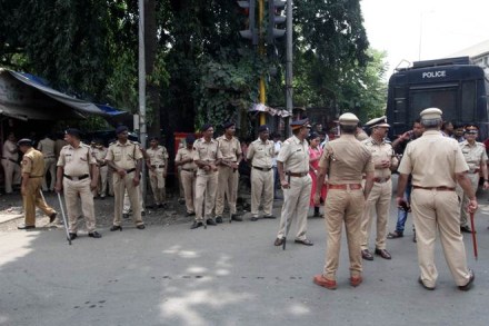 Police stand guard outside the Aarey Colony after demonstrators held a protest demanding that the Mumbai Metro Rail Corp Ltd not cut trees to build a train parking shed for an upcoming subway line, in Mumbai. (Reuters) Police stand guard outside the Aarey Colony after demonstrators held a protest demanding that the Mumbai Metro Rail Corp Ltd not cut trees to build a train parking shed for an upcoming subway line, in Mumbai. (Reuters)