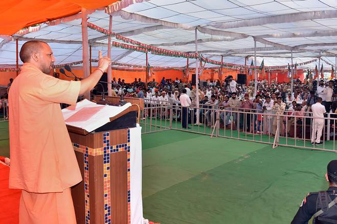 Uttar Pradesh Chief Minister Yogi Adityanath addresses during a campaign in support of BJP candidate Kavita Jain ahead of Haryana Assembly polls in Sonipat on Friday. (PTI Photo)