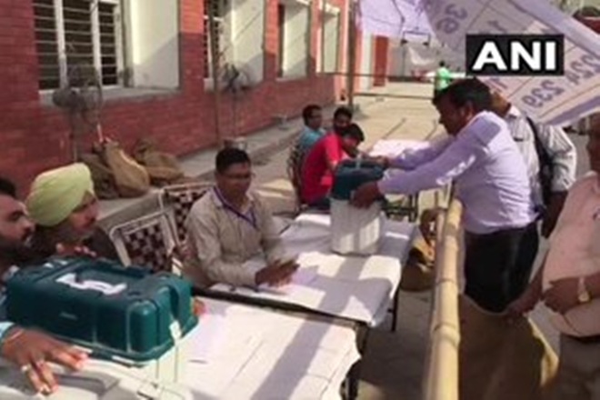 Polling officers leave from Ambala for their respective polling booths ahead of Haryana Assembly Polls on Monday. (ANI Photo) Polling officers leave from Ambala for their respective polling booths ahead of Haryana Assembly Polls on Monday. (ANI Photo)