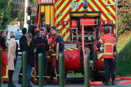 Local residents and firemen stand next to a fire truck after an incident at a mosque in Bayonne, southwestern France. (Photo: AP)
 Local residents and firemen stand next to a fire truck after an incident at a mosque in Bayonne, southwestern France. (Photo: AP)