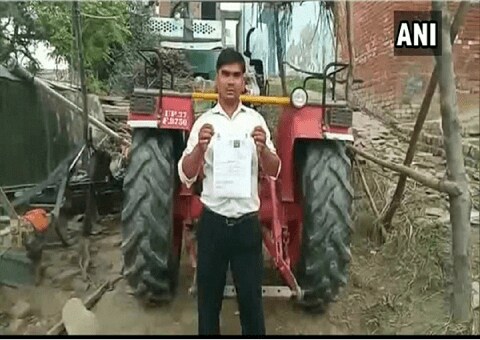 Tractor driver gets Rs 3,000 fine for driving without helmet, licence in Hapur