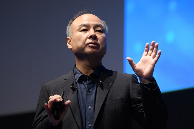 Masayoshi Son, chairman and chief executive officer of SoftBank Group Corp., speaks during the SoftBank World 2019 event in Tokyo, Japan, on Thursday, July 18, 2019. The founders of Southeast Asian ride-hailing giant Grab, indoor farming startup Plenty, Indian hotel chain OYO Rooms and payments service Paytm took the stage at an annual SoftBank conference to explain how artificial intelligence helps them stay on top in their respective fields. Photographer: Akio Kon/Bloomberg Masayoshi Son, chairman and chief executive officer of SoftBank Group Corp., speaks during the SoftBank World 2019 event in Tokyo, Japan, on Thursday, July 18, 2019. The founders of Southeast Asian ride-hailing giant Grab, indoor farming startup Plenty, Indian hotel chain OYO Rooms and payments service Paytm took the stage at an annual SoftBank conference to explain how artificial intelligence helps them stay on top in their respective fields. Photographer: Akio Kon/Bloomberg