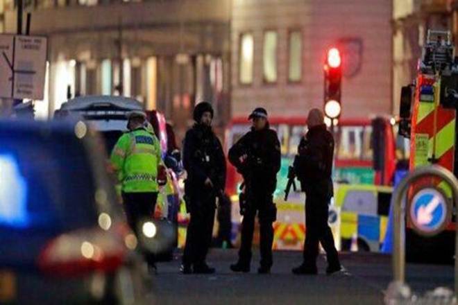 Armed police officers on the north side of London Bridge in London (AP Photo) Armed police officers on the north side of London Bridge in London (AP Photo)