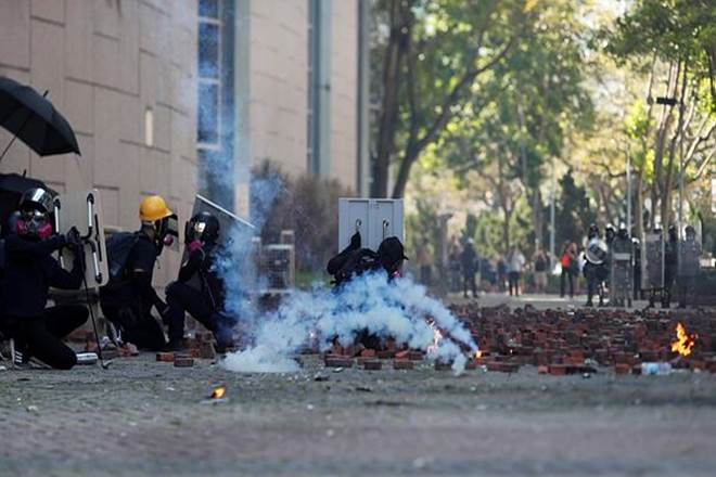 Many protesters appeared to have left the campuses by late Saturday but Hong Kong's Cross-Harbour Tunnel was still blocked by protesters occupying Polytechnic University. (Reuters image)