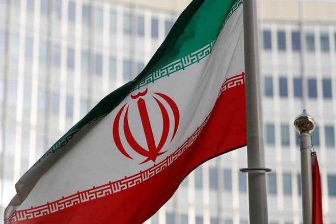 The Iranian flag flutters in front the International Atomic Energy Agency (IAEA) headquarters in Vienna (Reuters)