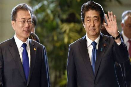 Moon and Abe held a "very friendly and serious" dialogue that lasted 11 minutes on the sidelines of the ASEAN Plus Three summit in Bangkok, Ko Min-jung, the South's presidential spokeswoman, told reporters Moon and Abe held a "very friendly and serious" dialogue that lasted 11 minutes on the sidelines of the ASEAN Plus Three summit in Bangkok, Ko Min-jung, the South's presidential spokeswoman, told reporters