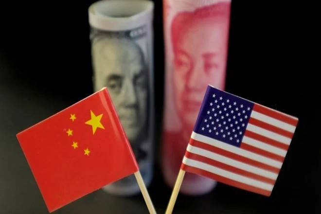 China and US flags. (Image: IE)