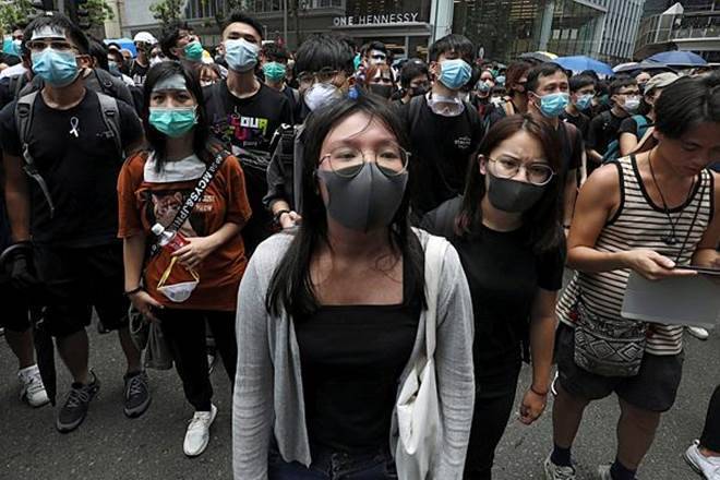 With China offering no concessions, protesters switched tactics this week when they launched a "blossom everywhere" campaign to cause as much disruption as possible and overwhelm the police force. 