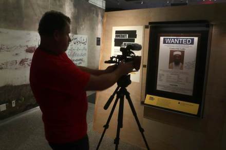 A man films an Osama bin Laden wanted poster at the 9/11 Museum in a display called "Revealed - The Hunt for Bin Laden" in the Manhattan borough of New York. (Reuters) A man films an Osama bin Laden wanted poster at the 9/11 Museum in a display called "Revealed - The Hunt for Bin Laden" in the Manhattan borough of New York. (Reuters)